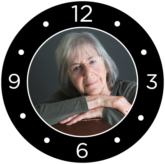 Clock face with portrait of woman in center